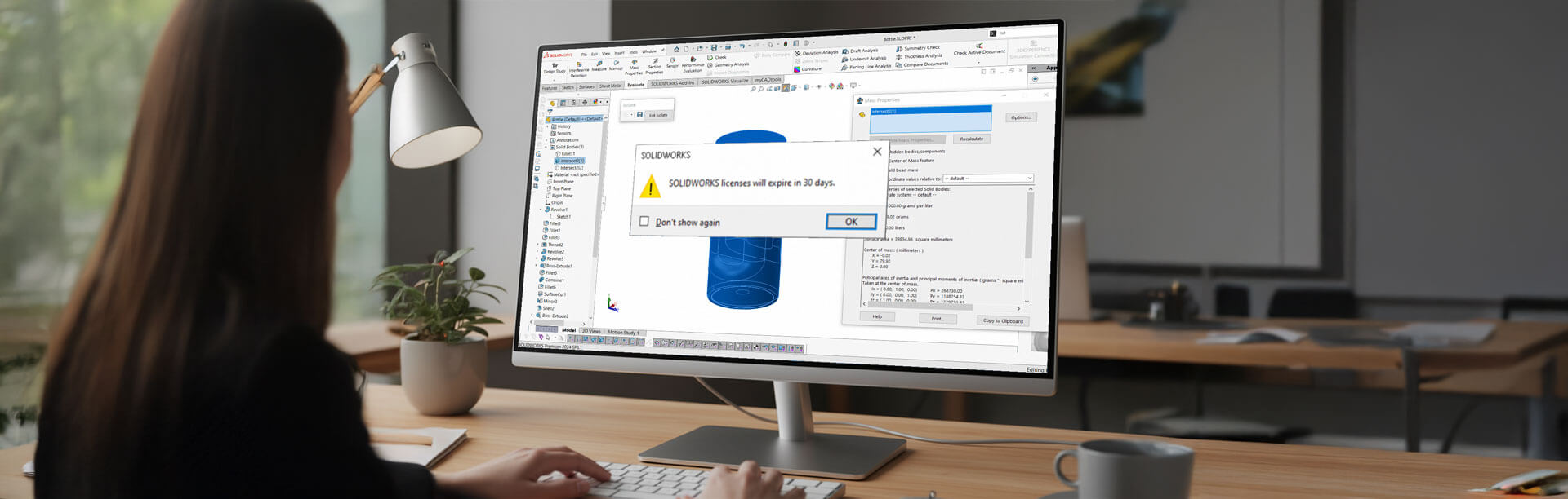 Computer with a SOLIDWORKS expiry message showing