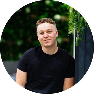 A headshot photograph of Charlie from CCE London